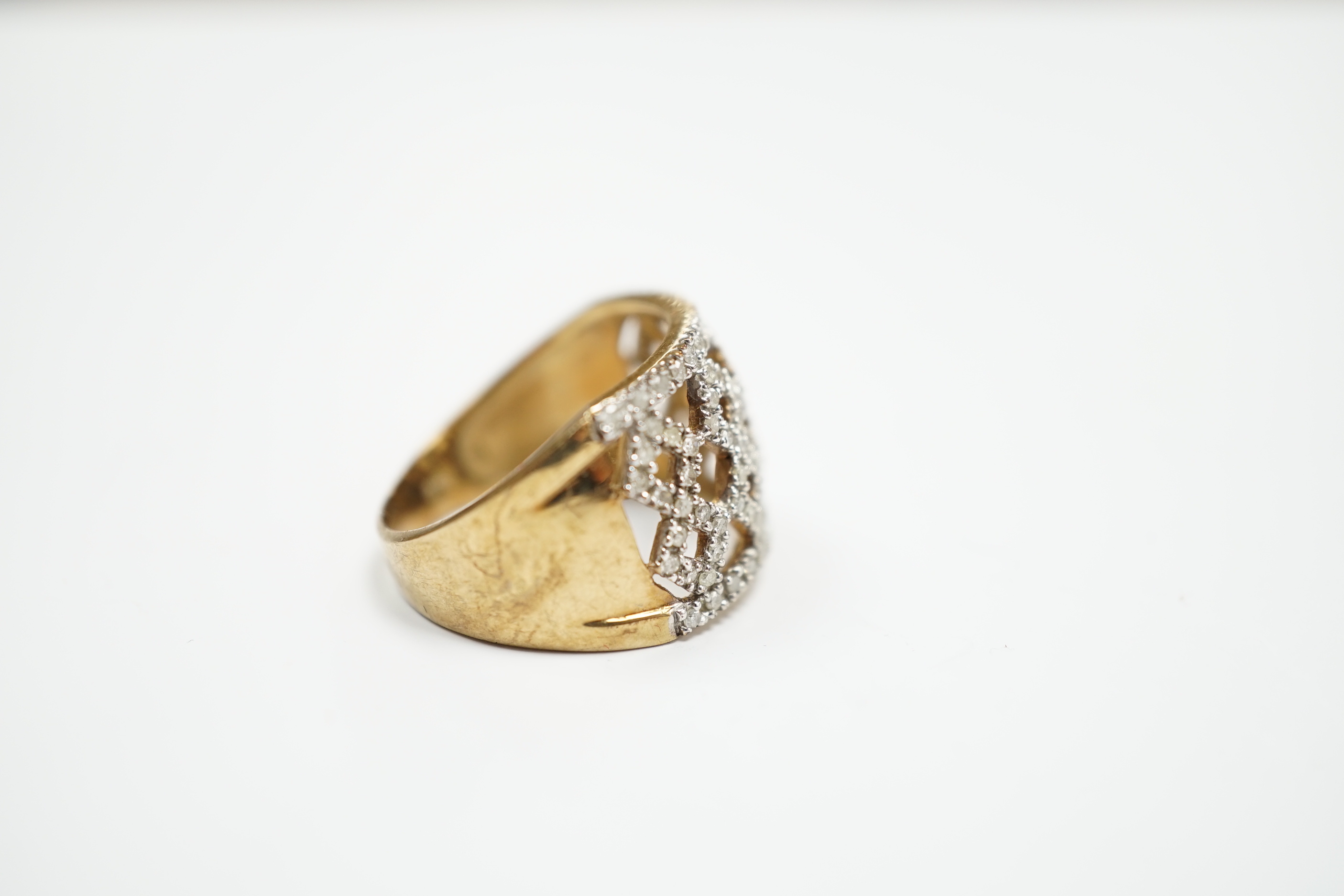 A modern 9ct gold and diamond chip cluster set dress ring, size P, gross weight 4.8 grams.